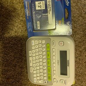 Brother label maker(PTD210) + one tape